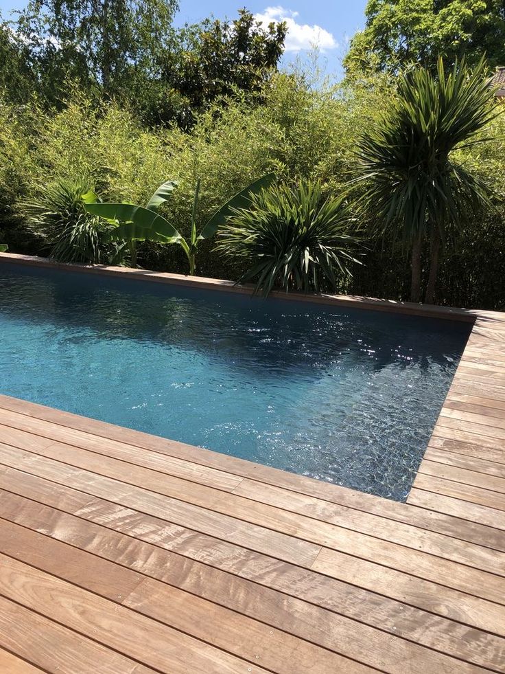 Wooden terrace around a pool